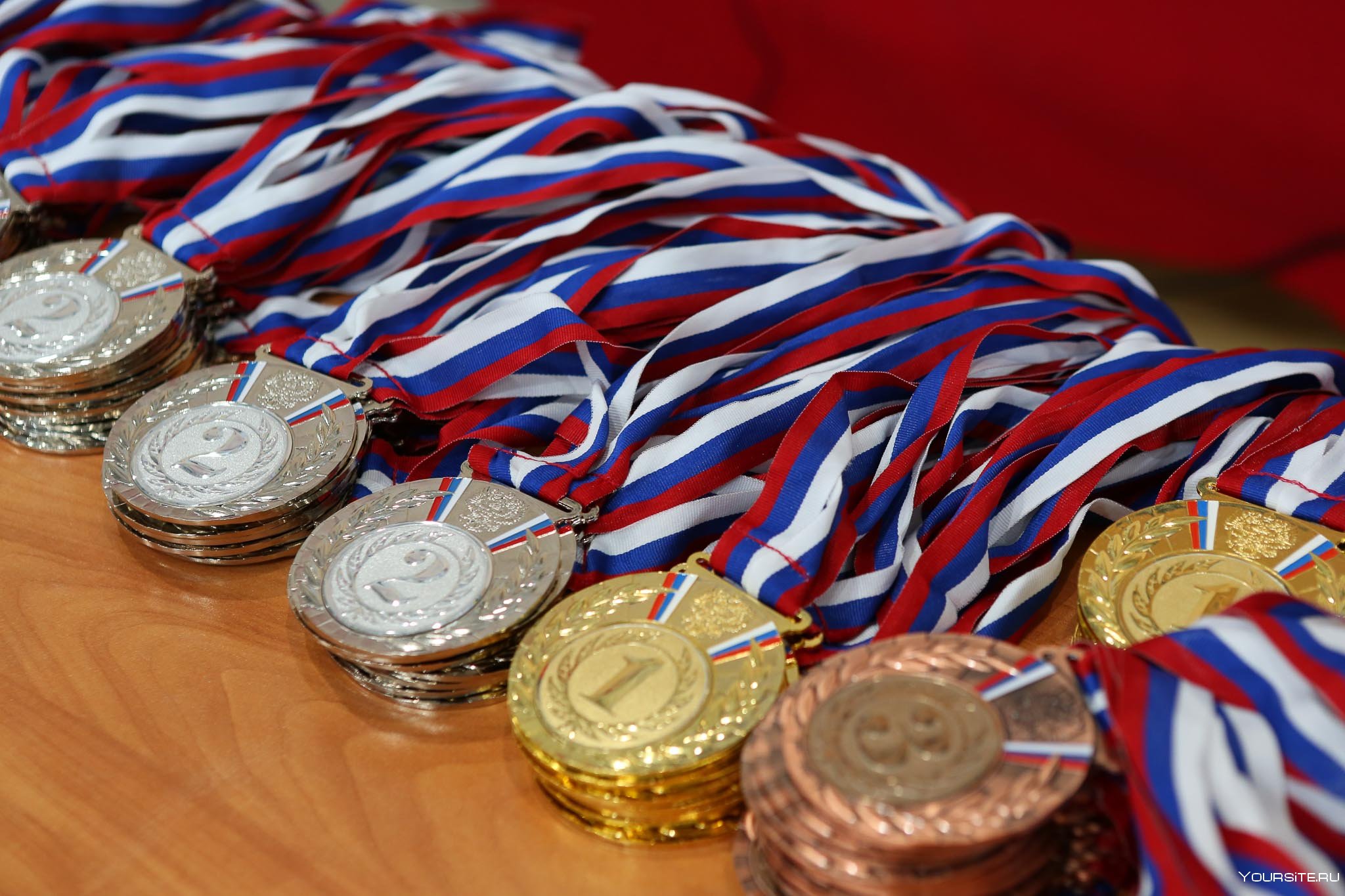 Sports medals. Медали спортивные. Спортивные награды. Много медалей. Медали по борьбе.