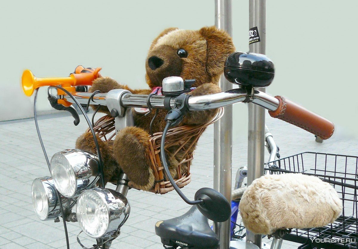 Мишка на велосипеде игрушка