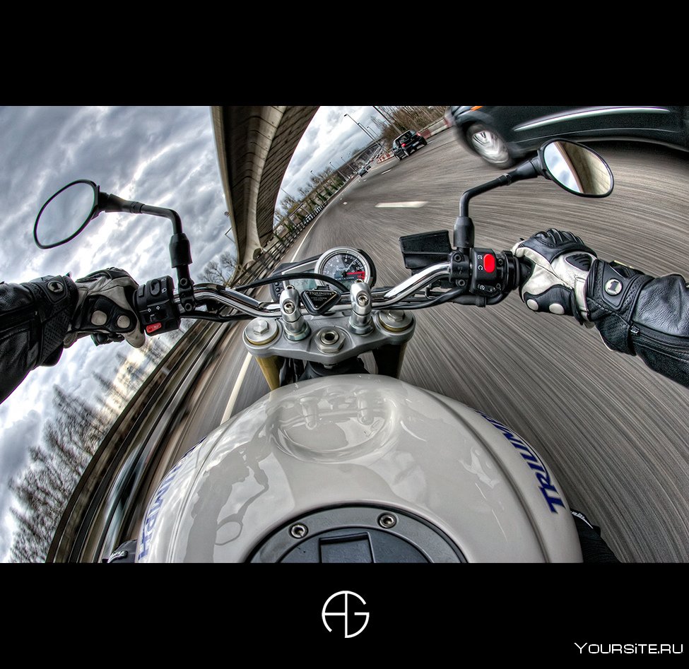 Картина за рулем мотоцикла