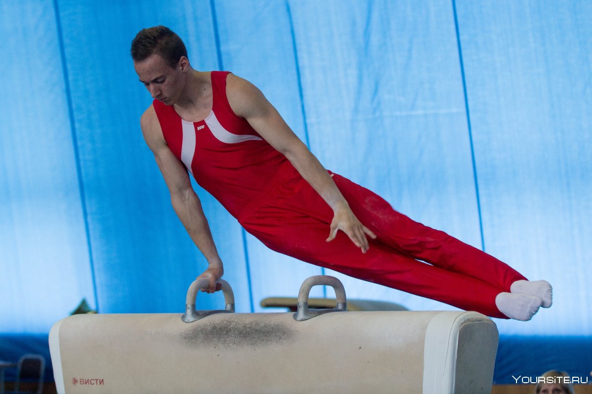 Евгений Корольков гимнаст