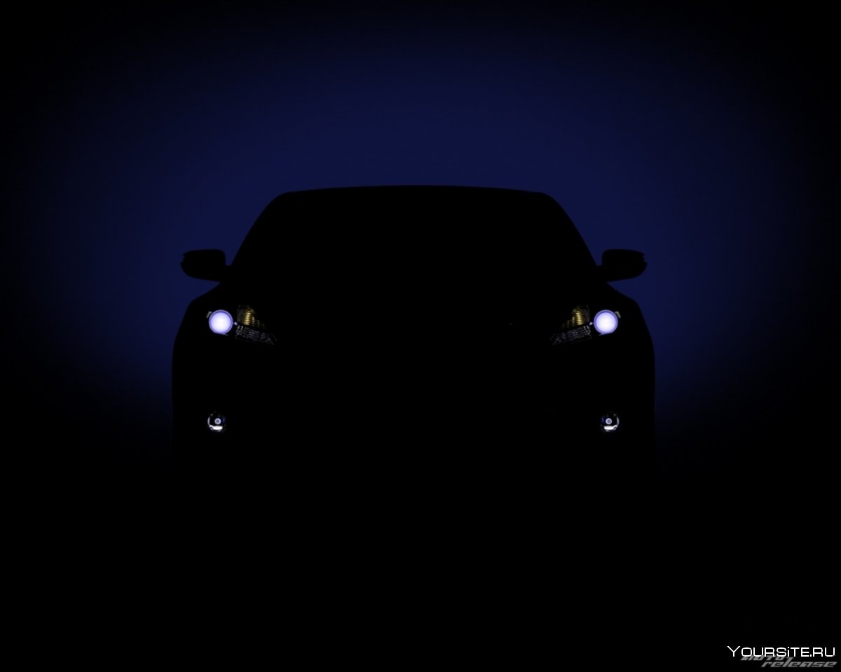 Фары автомобиля в темноте