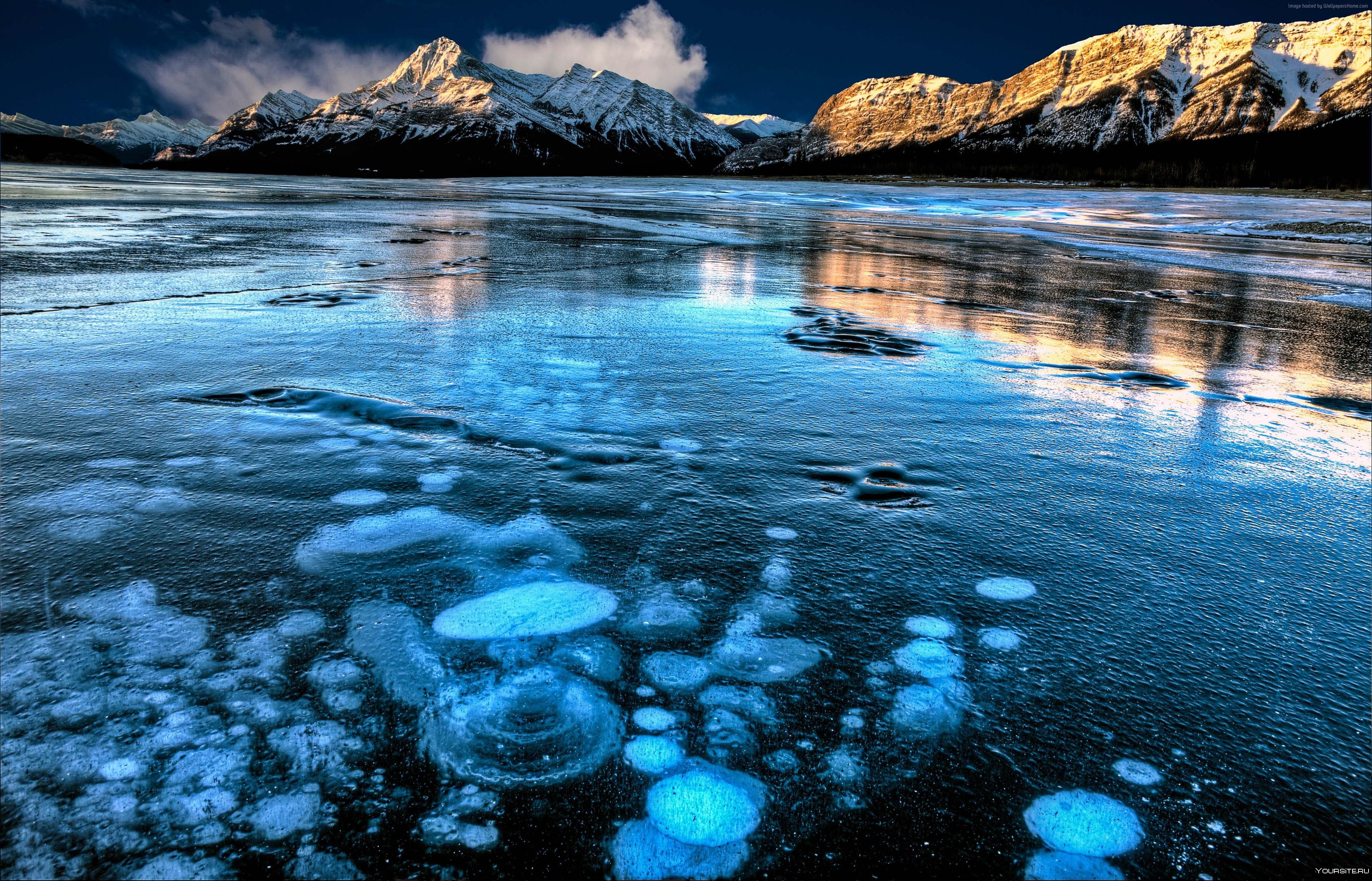 Озера озеро лед ледяной. Озеро Эйбрахам в Канаде. Ледяные пузыри озера Абрахам Канада.
