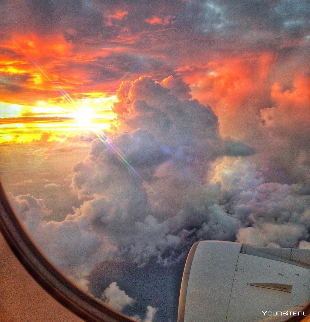 Облака из окна самолета