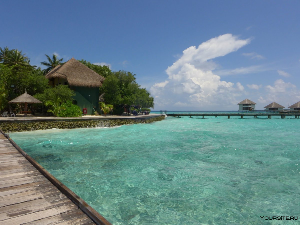 Мальдивы остров Курамати топлесс