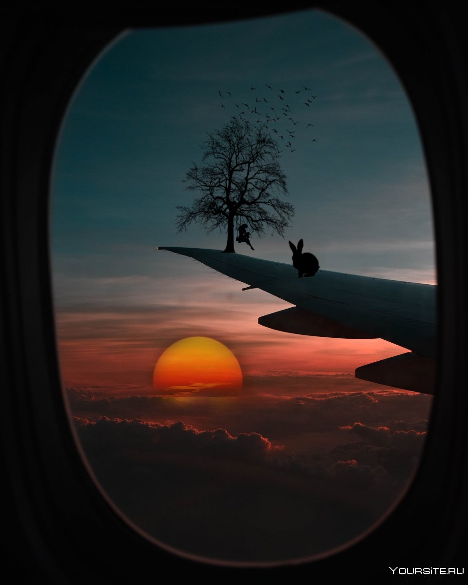 Рассвет из иллюминатора самолета