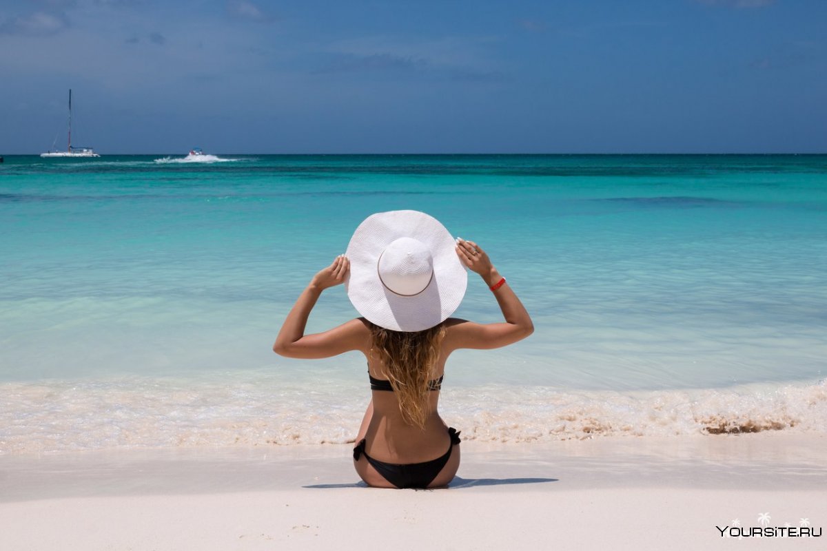 Девушка в шляпе море Доминикана