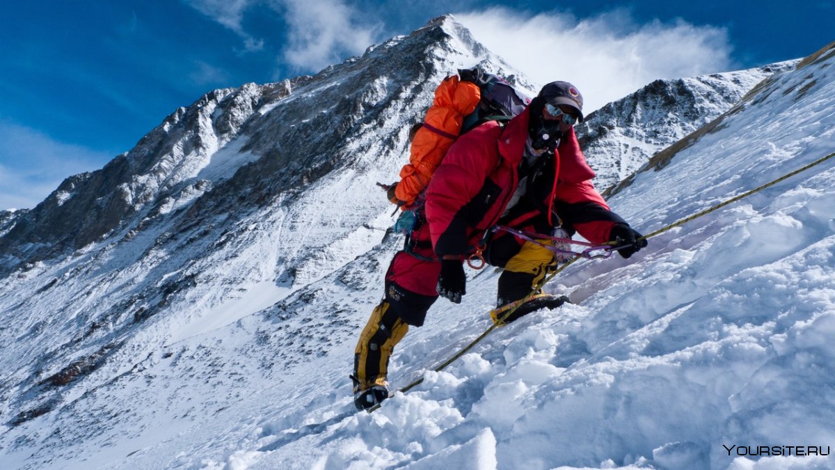 Альпинист зима горы