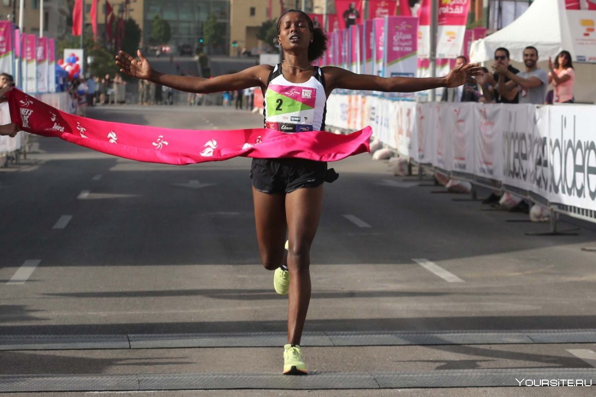 Женщина марафонец