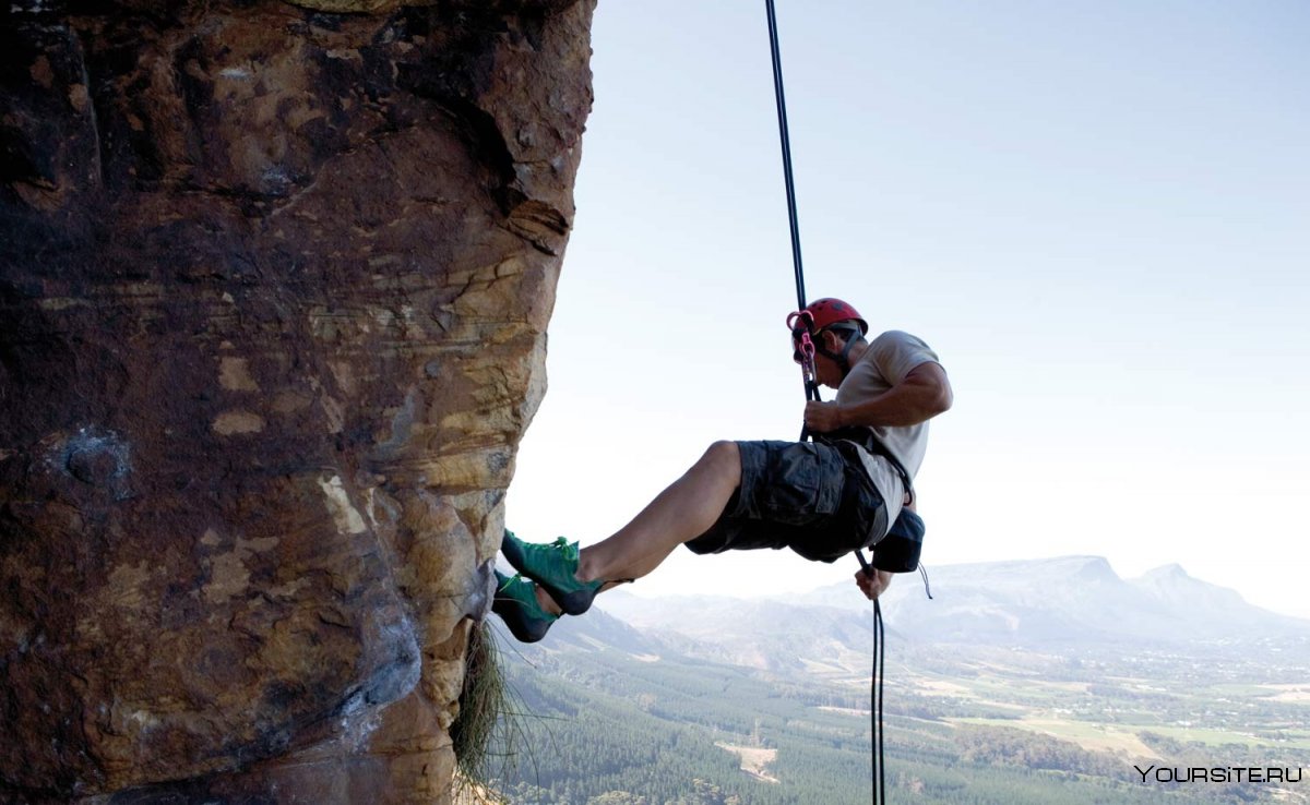 Скалолаз на веревке