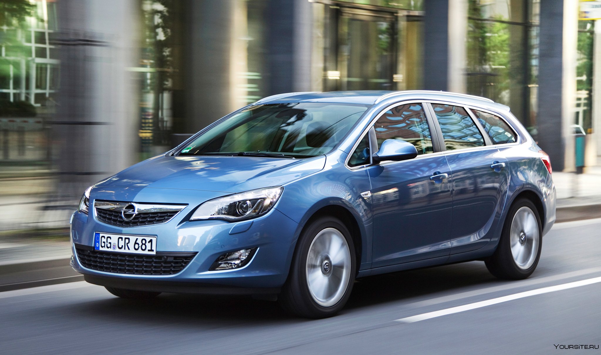 Опель какие модели. Opel Astra Sports Tourer 2012. Opel Astra j универсал.