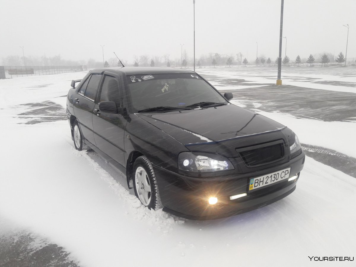 Чери амулет 2006 черная в снегу