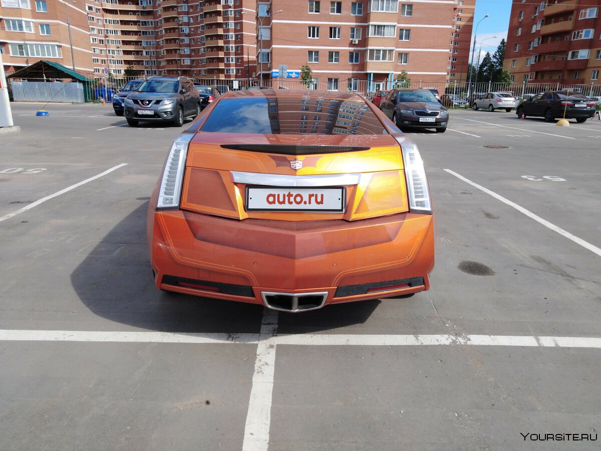 Cadillac CTS 2 оранжевый