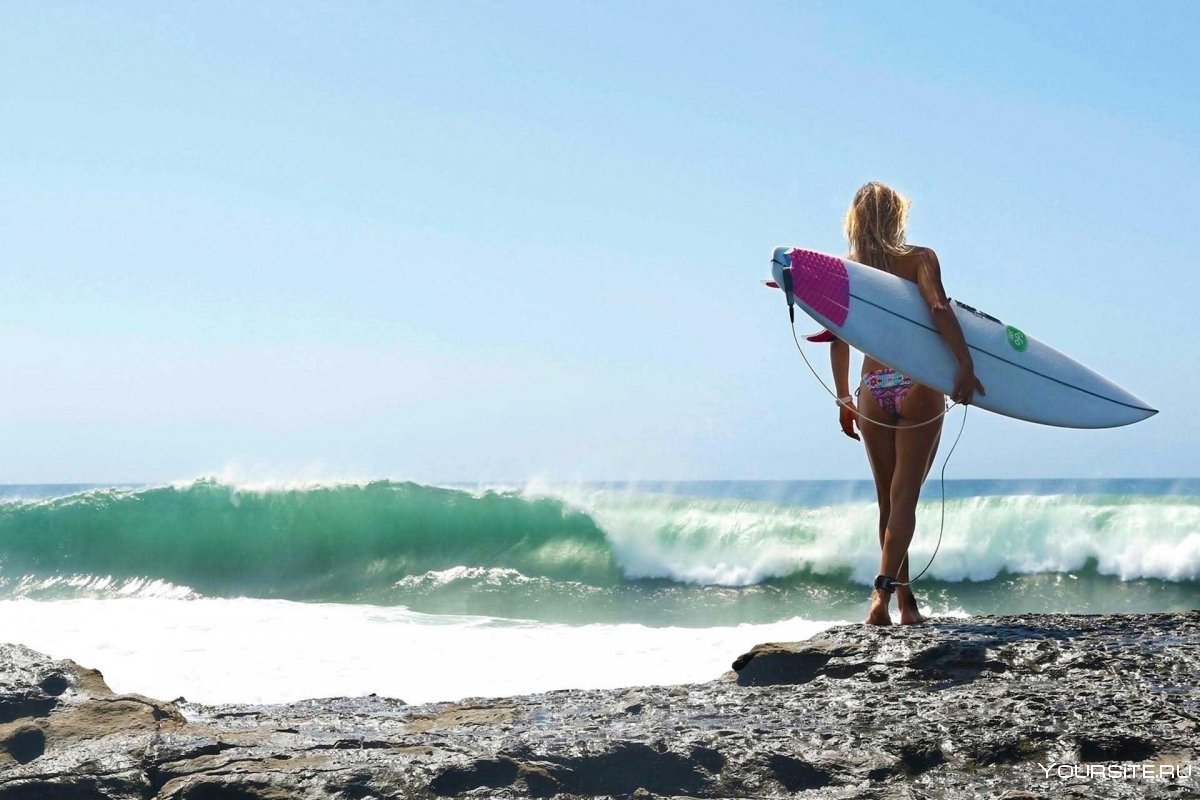 Alana Blanchard surfing