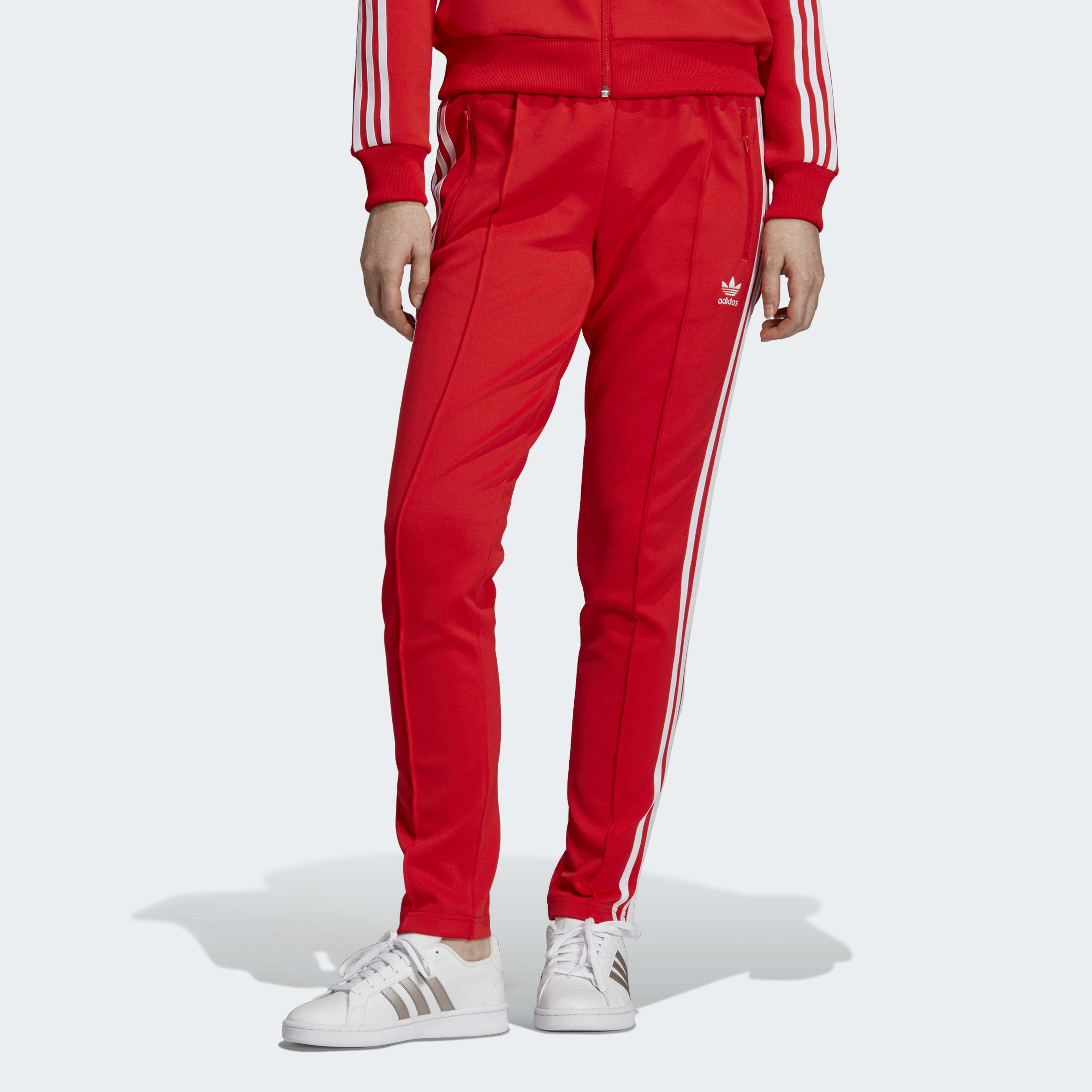 Красные штаны адидас. Красные спортивки адидас. Спортивные брюки adidas SST Pants PB. Штаны адидас Essentials 3 оригинал красный. Спортивки adidas Originals красные.