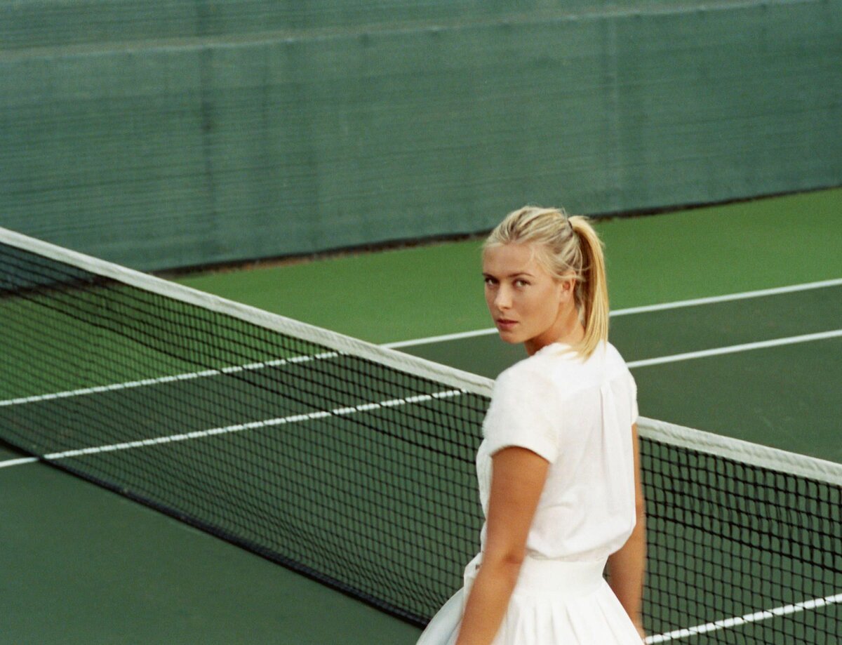 Мария Шарапова на теннисном корте