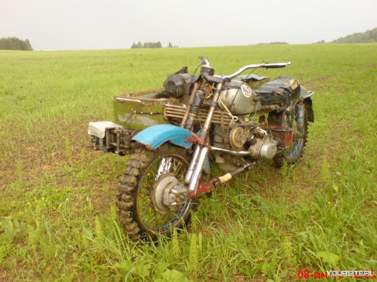 Мотоцикл Урал полный привод