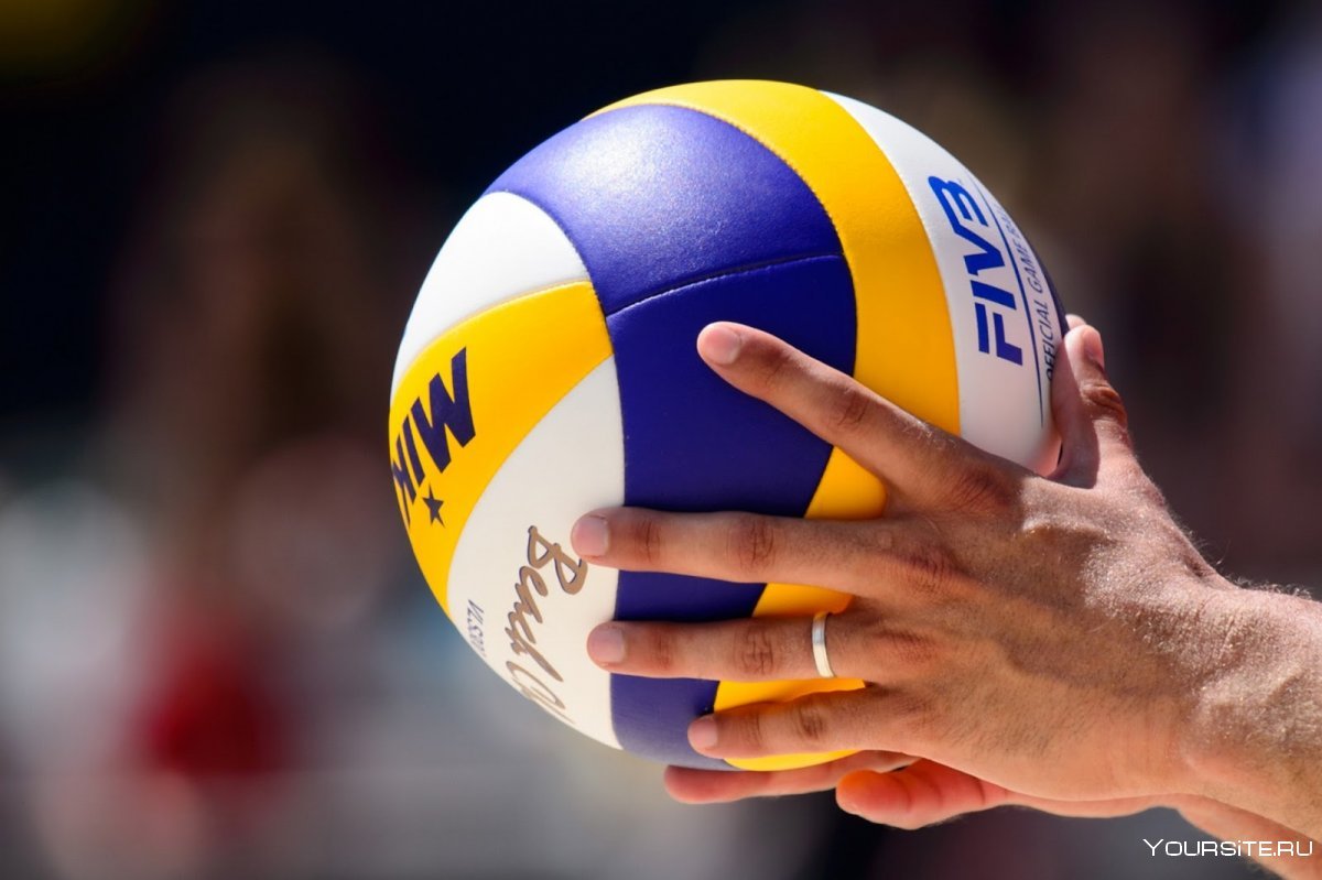 Волейбольный мяч на пальце