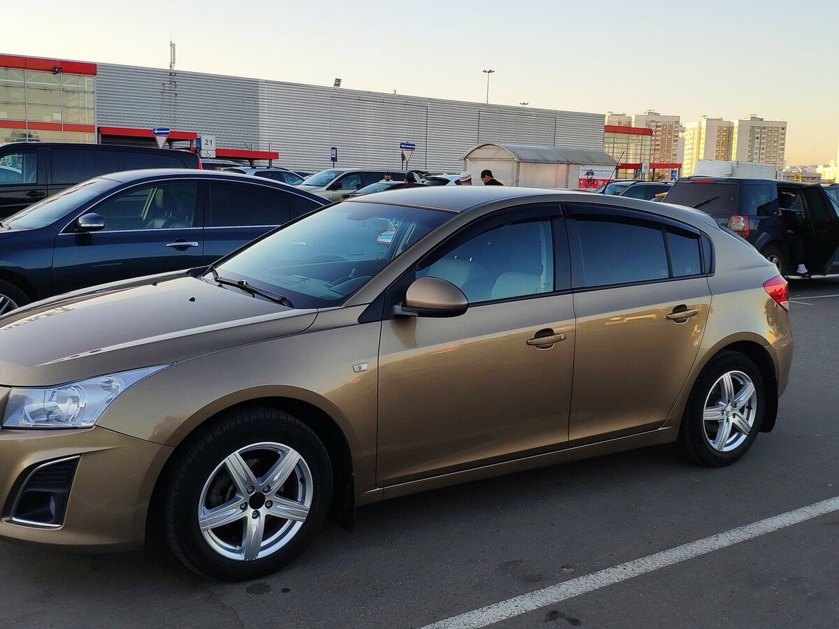 Chevrolet Cruze 2013 коричневый металлик