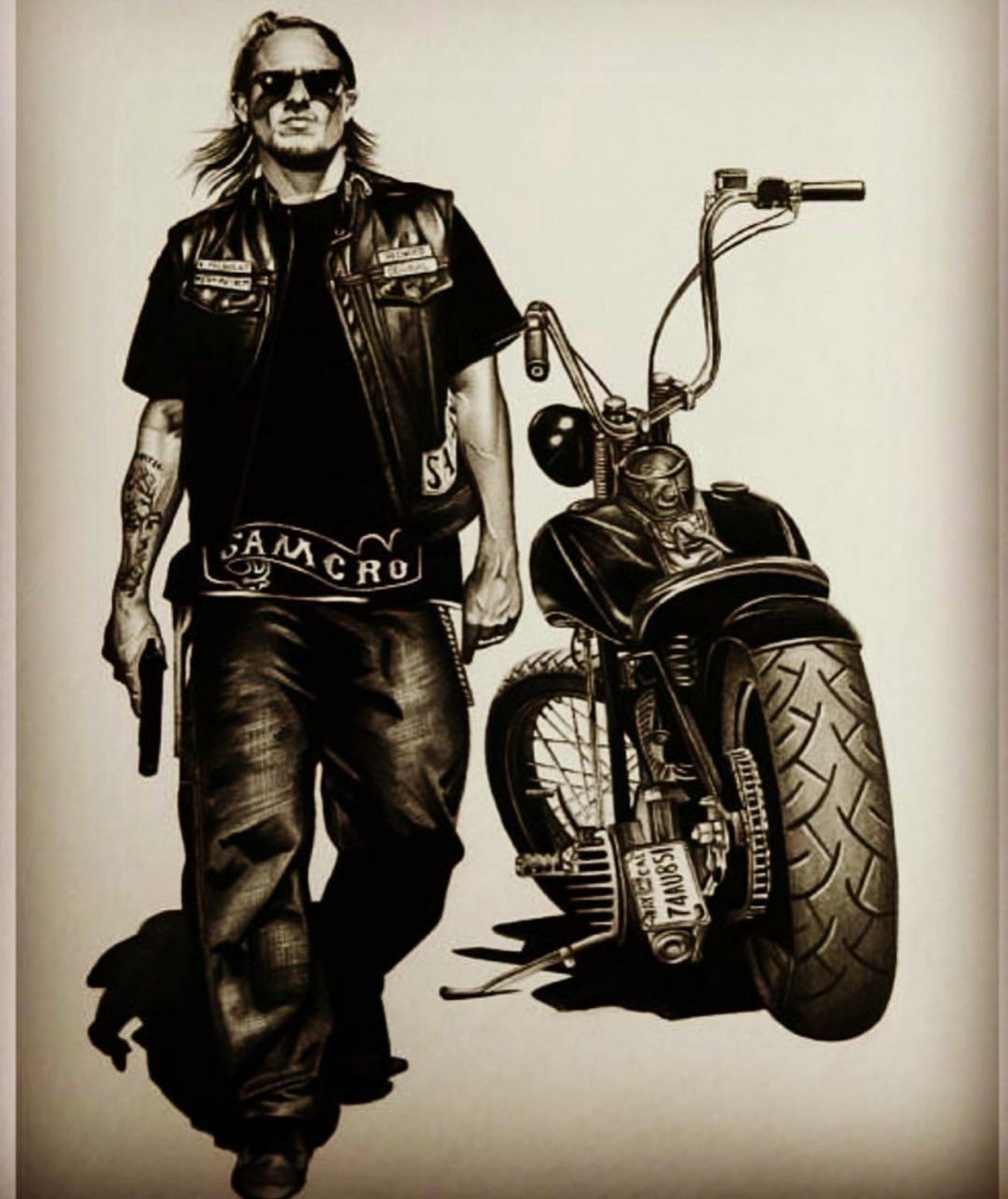 Чарли Ханнэм на мотоцикле