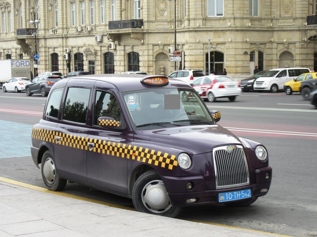 КЭБ желтое такси Лондон