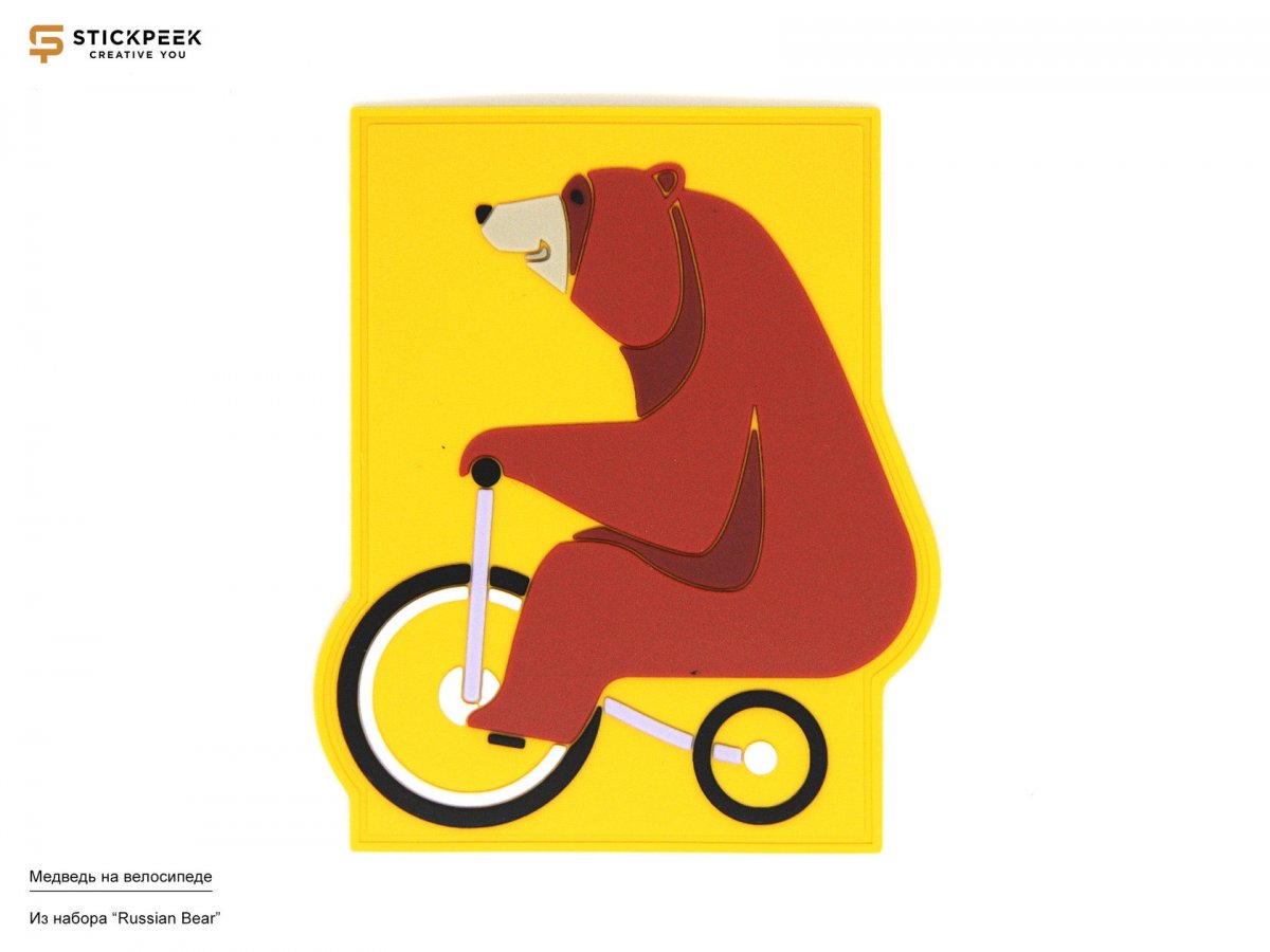 Медведь на детском велосипеде