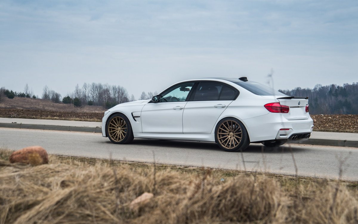 White car Bronze Wheels