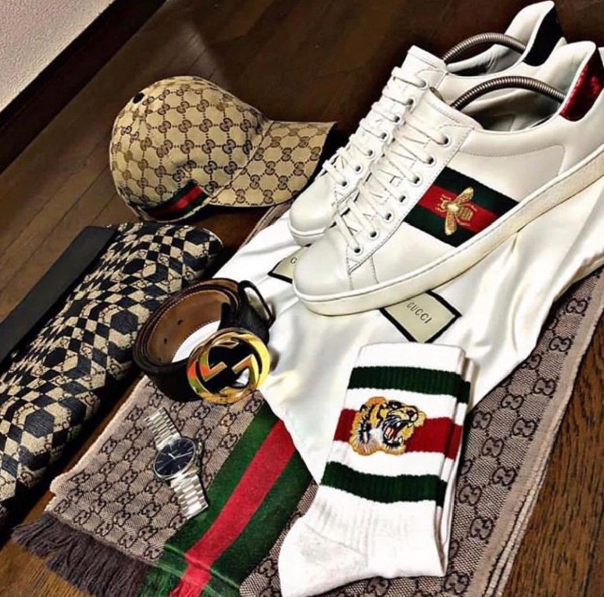 Гуччи знак бренда