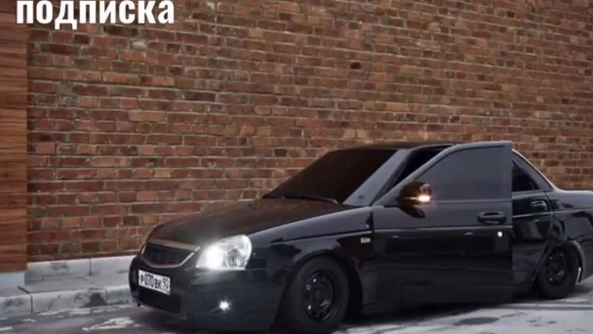 Лада Приора черная заниженная