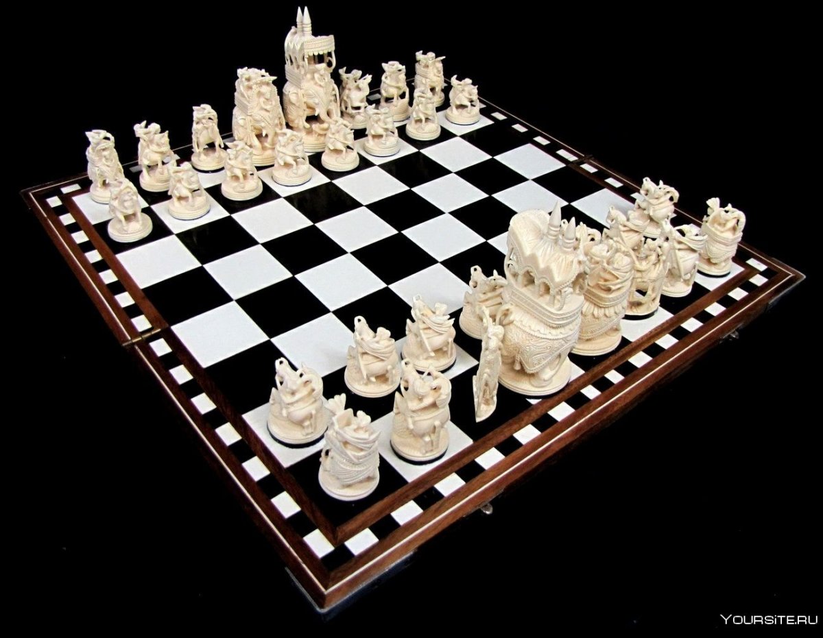 Шахматы ферзь из слоновой кости