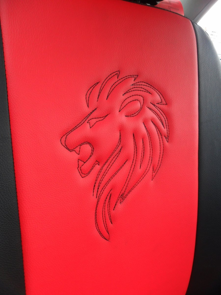 Марка автомобиля со львом