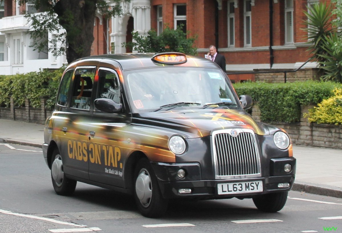 КЭБ ретро такси Лондон