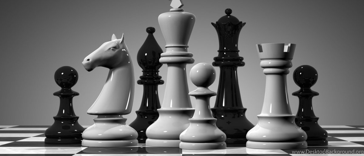 Шахматные фигуры на черном фоне