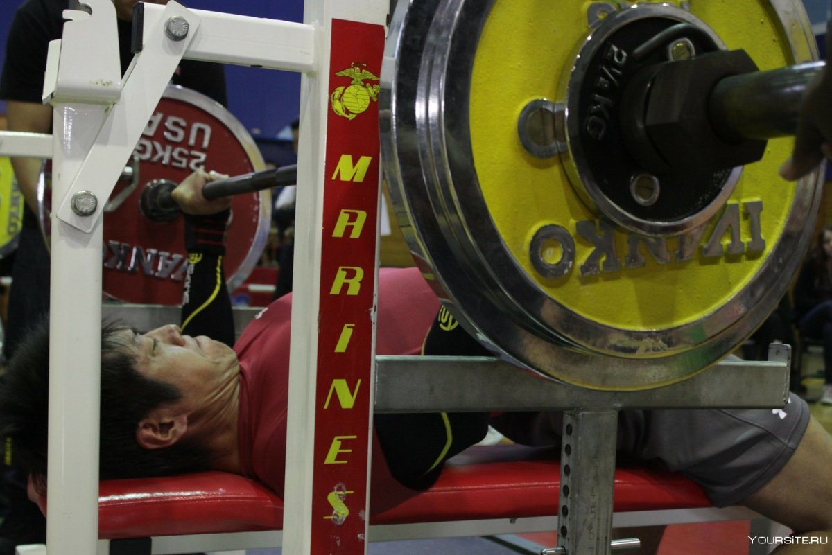 The Powerlifter Bench Presses