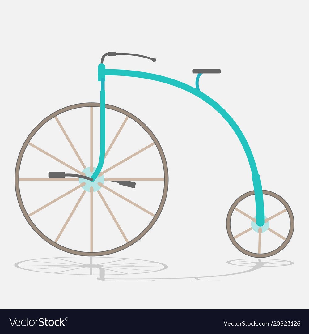 Старый велосипед с большим передним колесом и маленьким задним