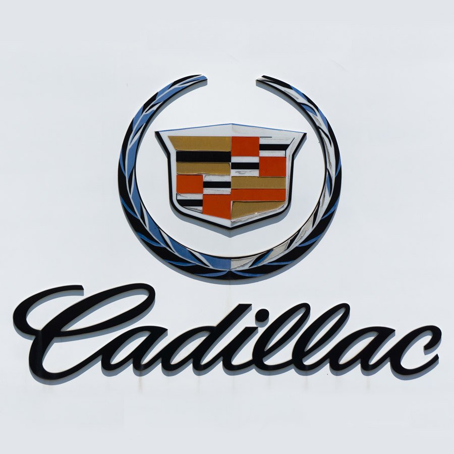 Эмблема Кадиллак и Джили