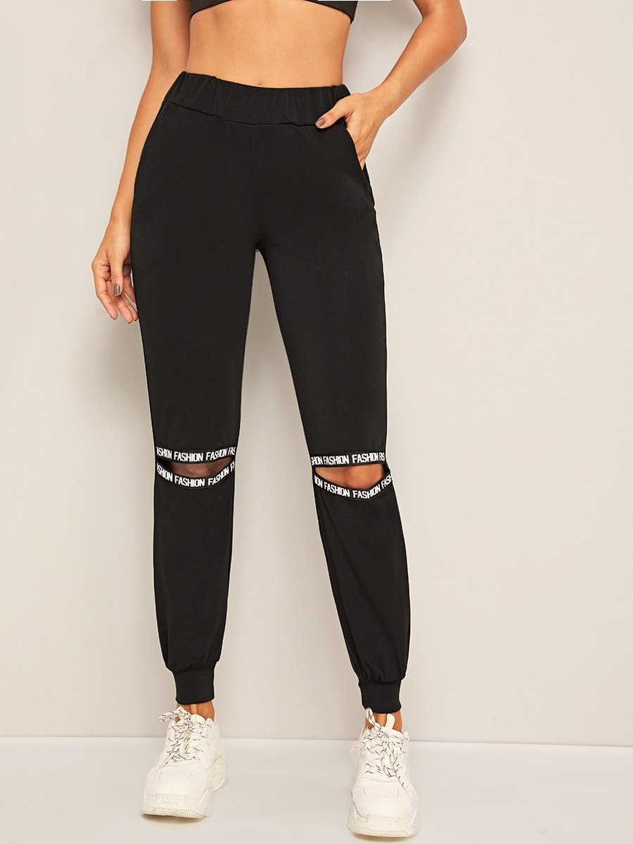 Спортивные штаны с прорезями