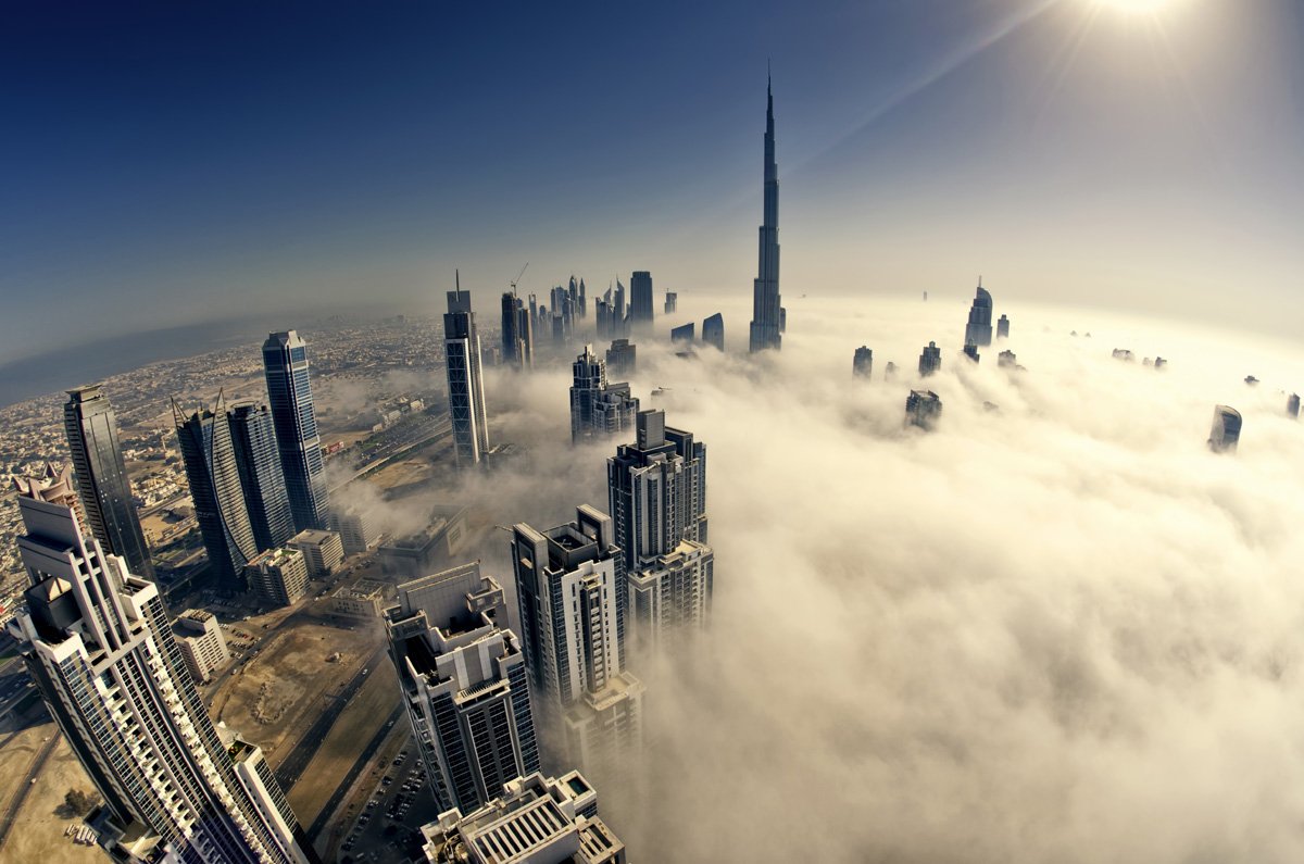 Дубай сверху. Дубай ОАЭ вид сверху. Бурдж Халифа из космоса. Бурдж Халифа в облаках. Небоскребы Дубая сверху.