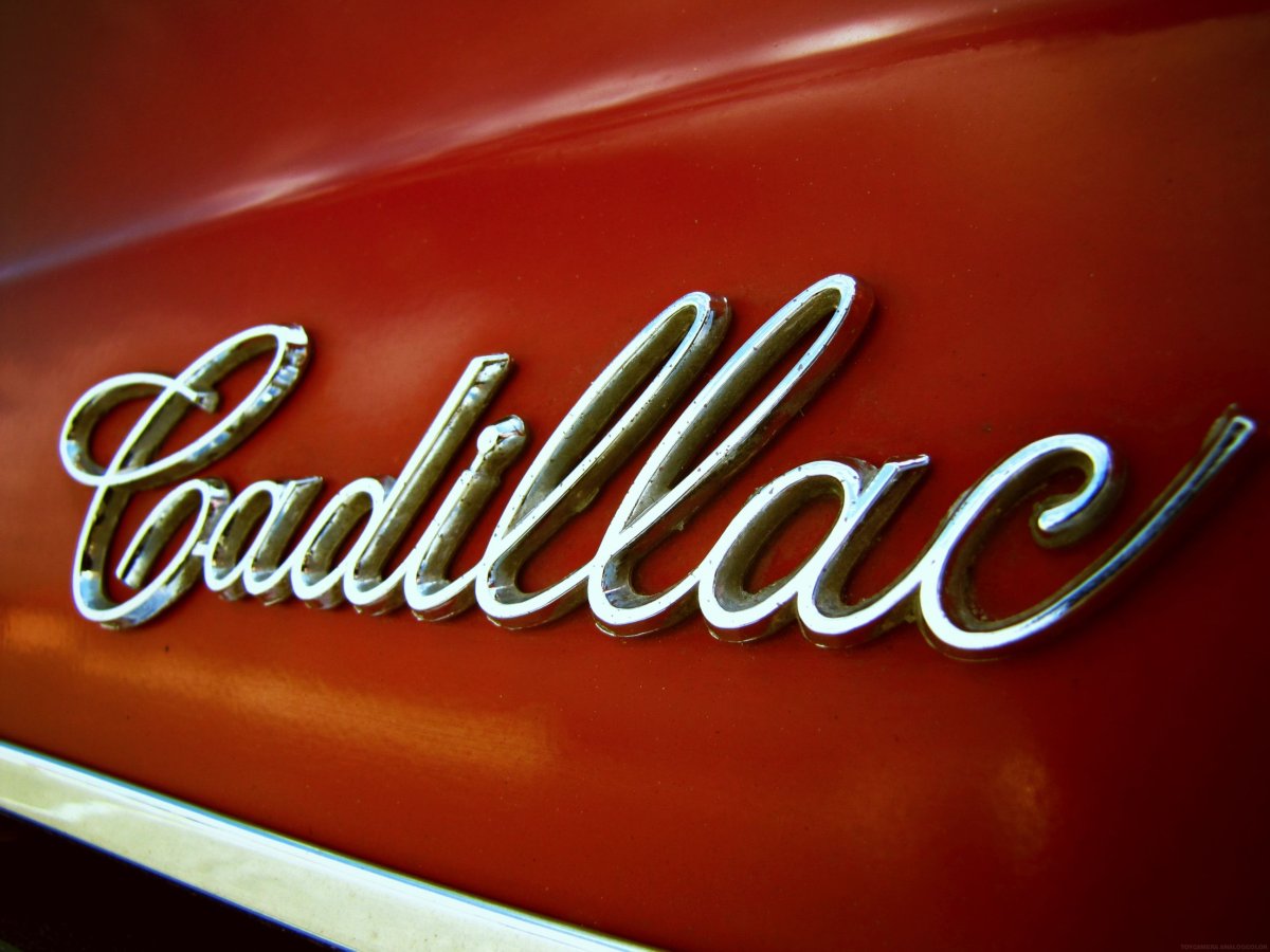 Надпись на Кадиллаке фото