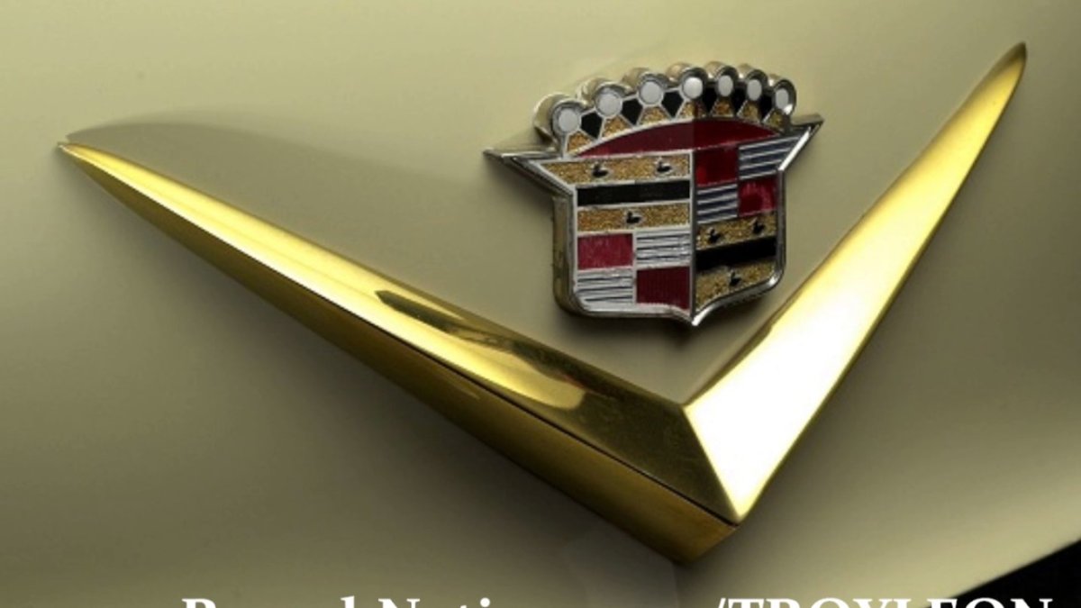 Кадиллак значок 1960