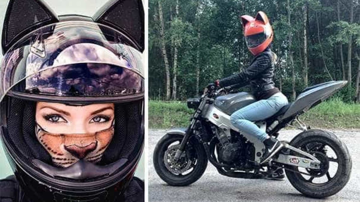 Девушка в мотоциклетном шлеме