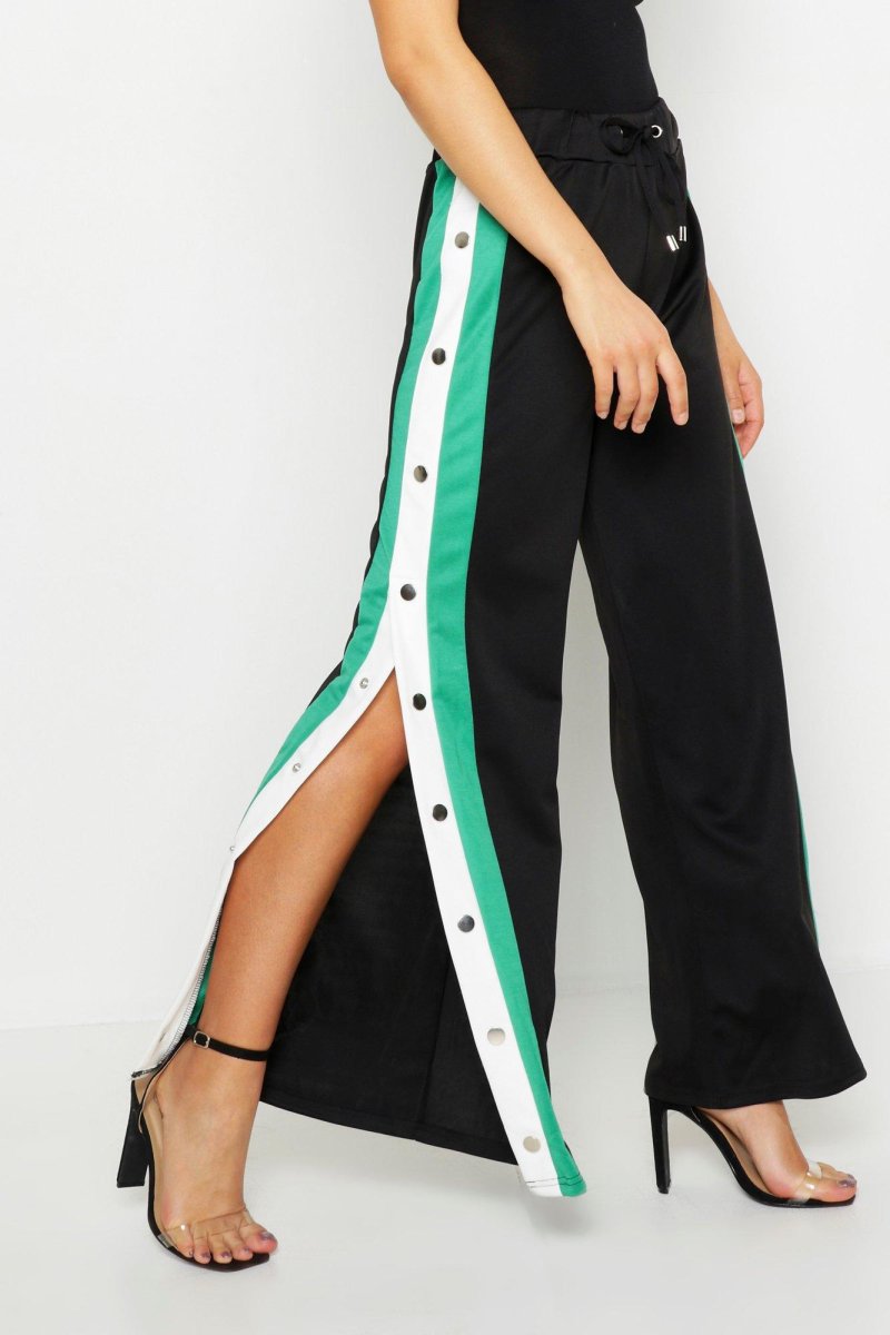 Брюки с кнопками по бокам женские