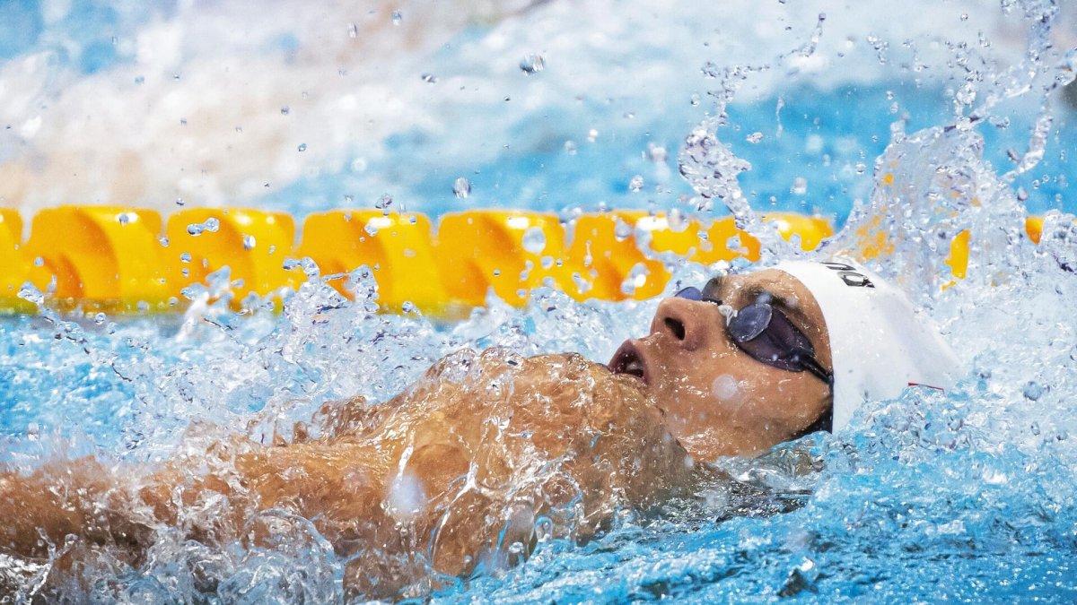 Евгений Рылов (плавание, 100 м на спине