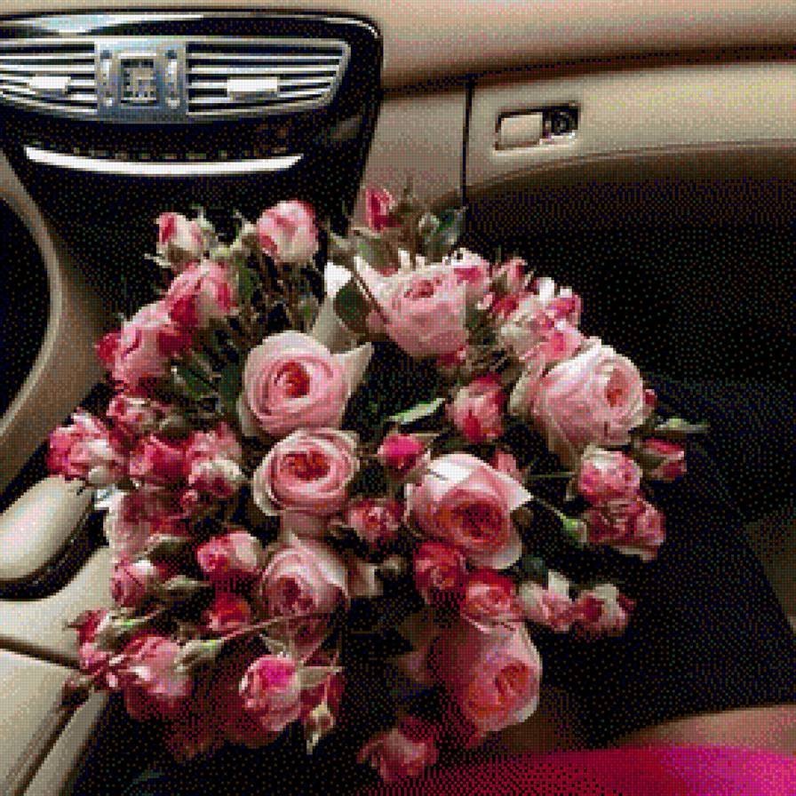 Девушка с цветами в машине