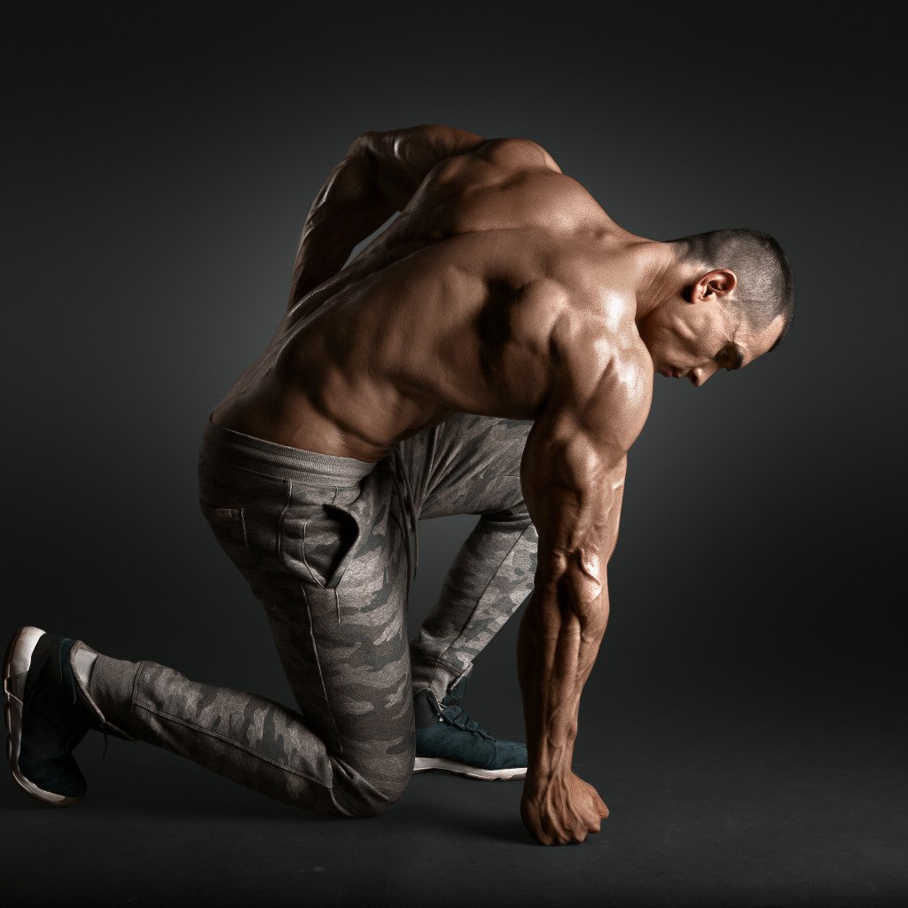 Muscle posing from back