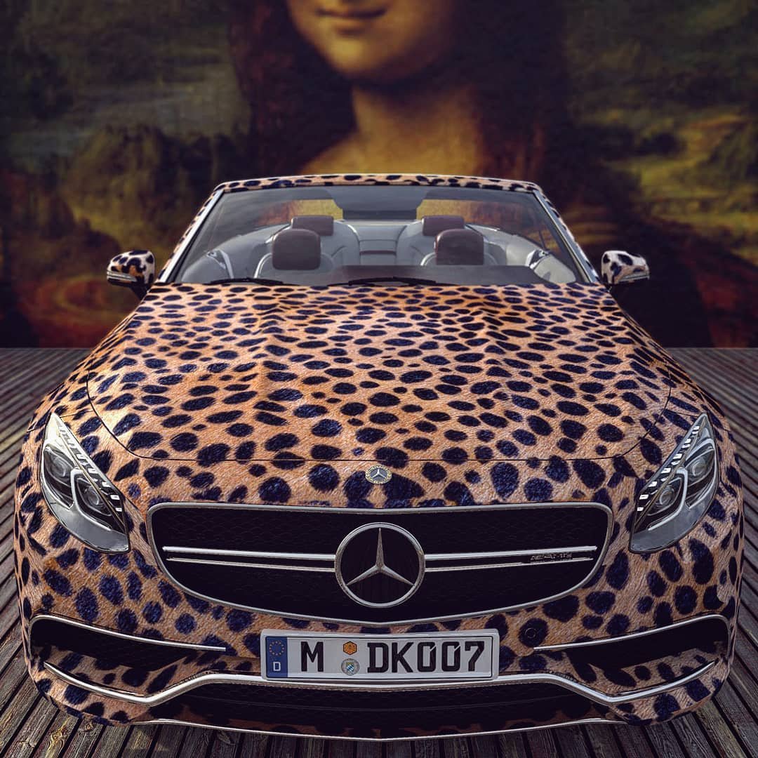 Машина с леопардовым принтом