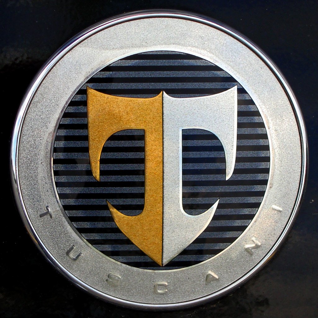 Значок буква т. Марка автомобиля Тибурон. Значки автомобилей. Марка авто с логотипом т. Машина со значком т.