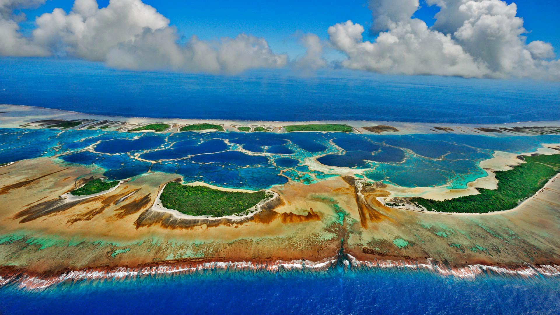 Страна состоящая из островов. Атолл Кирибати. Остров Каролайн, Кирибати. Тарава Кирибати. Каролайн Атолл.