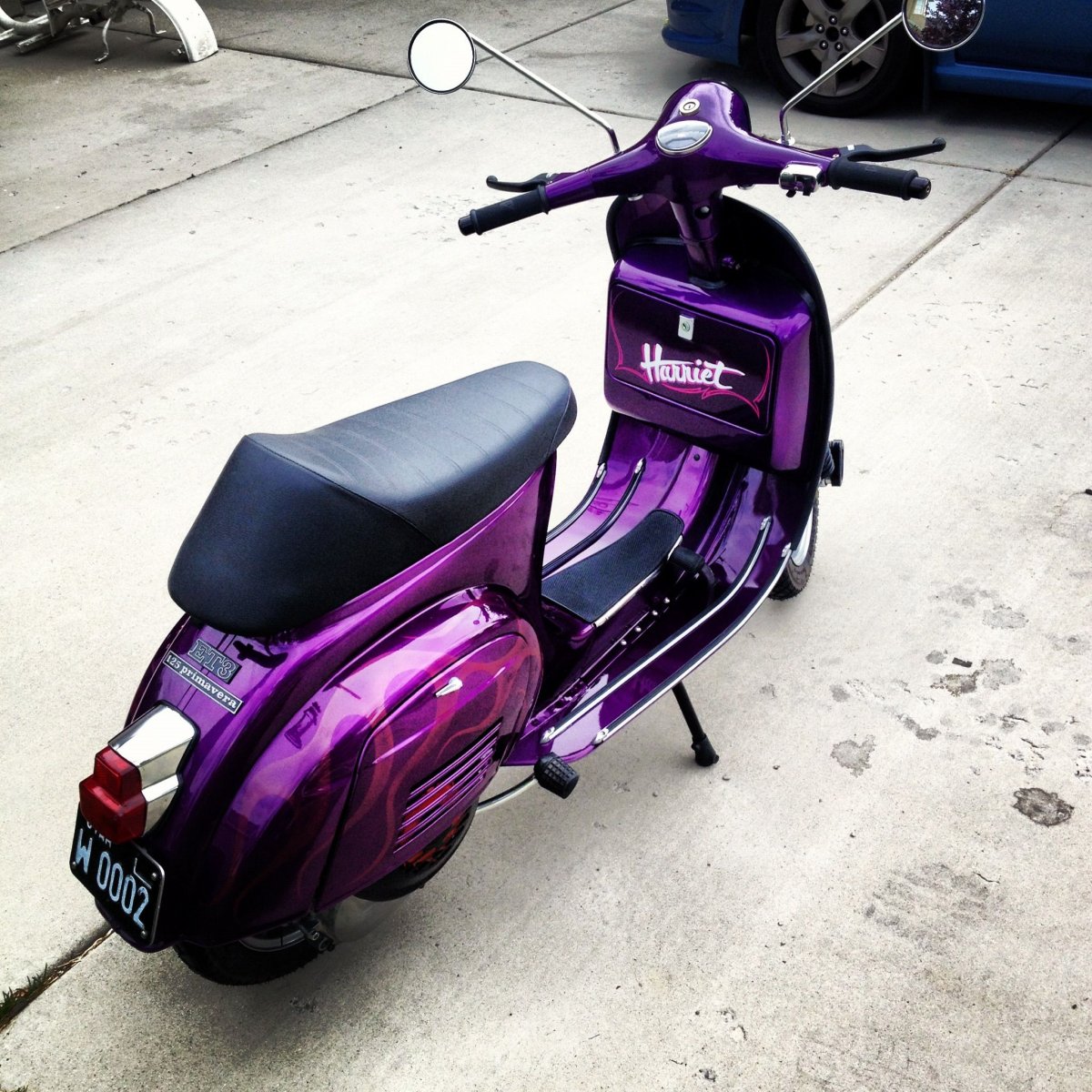 Фиолетовый скутер